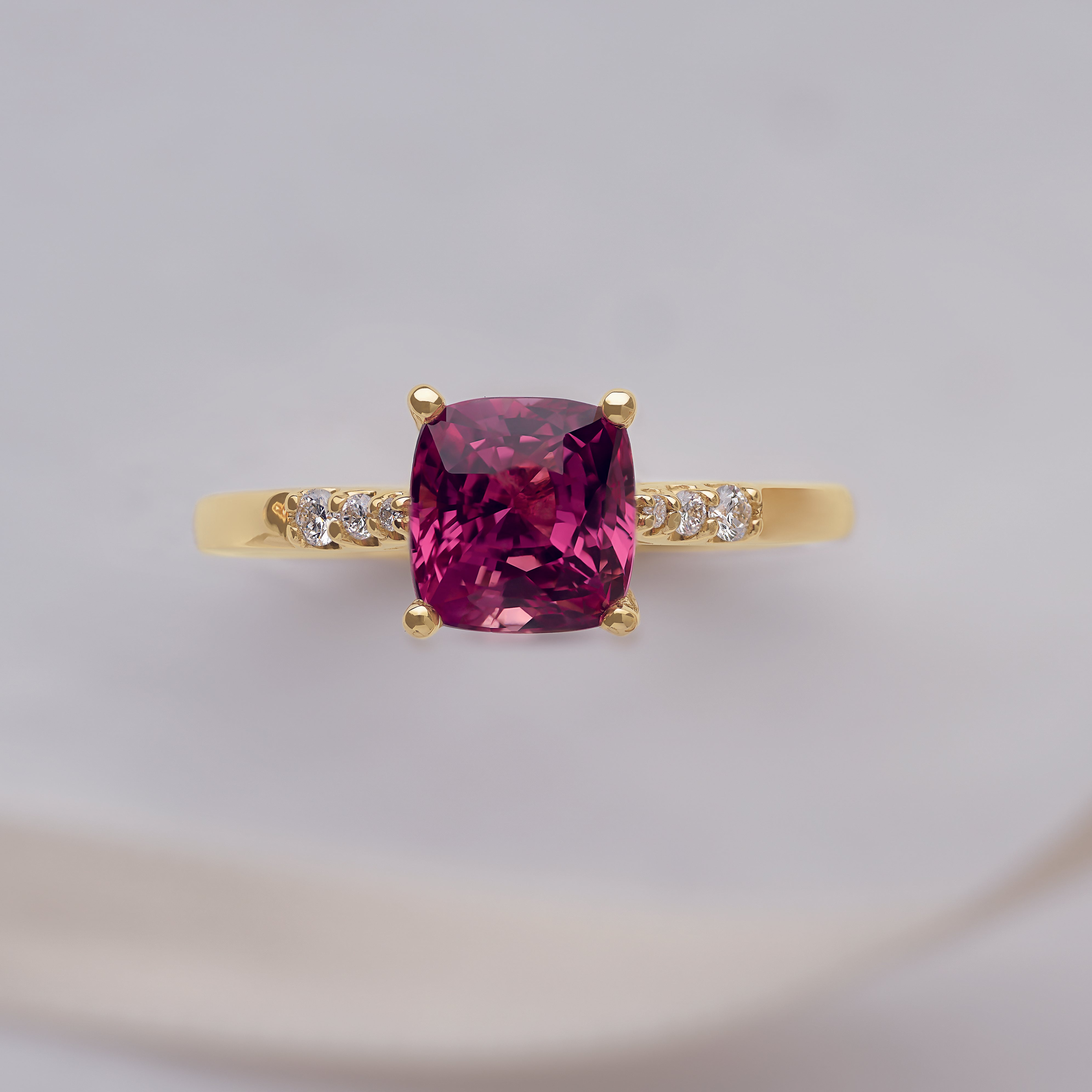 Tourmaline, diamond and gold gemstone engagement ring