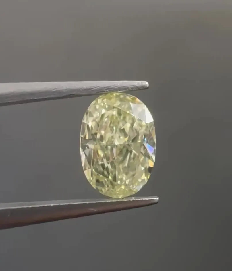 0.70ct Oval Natural Diamond (Colour Fancy Light Greenish Yellow, Clarity SI2, GIA Certified)